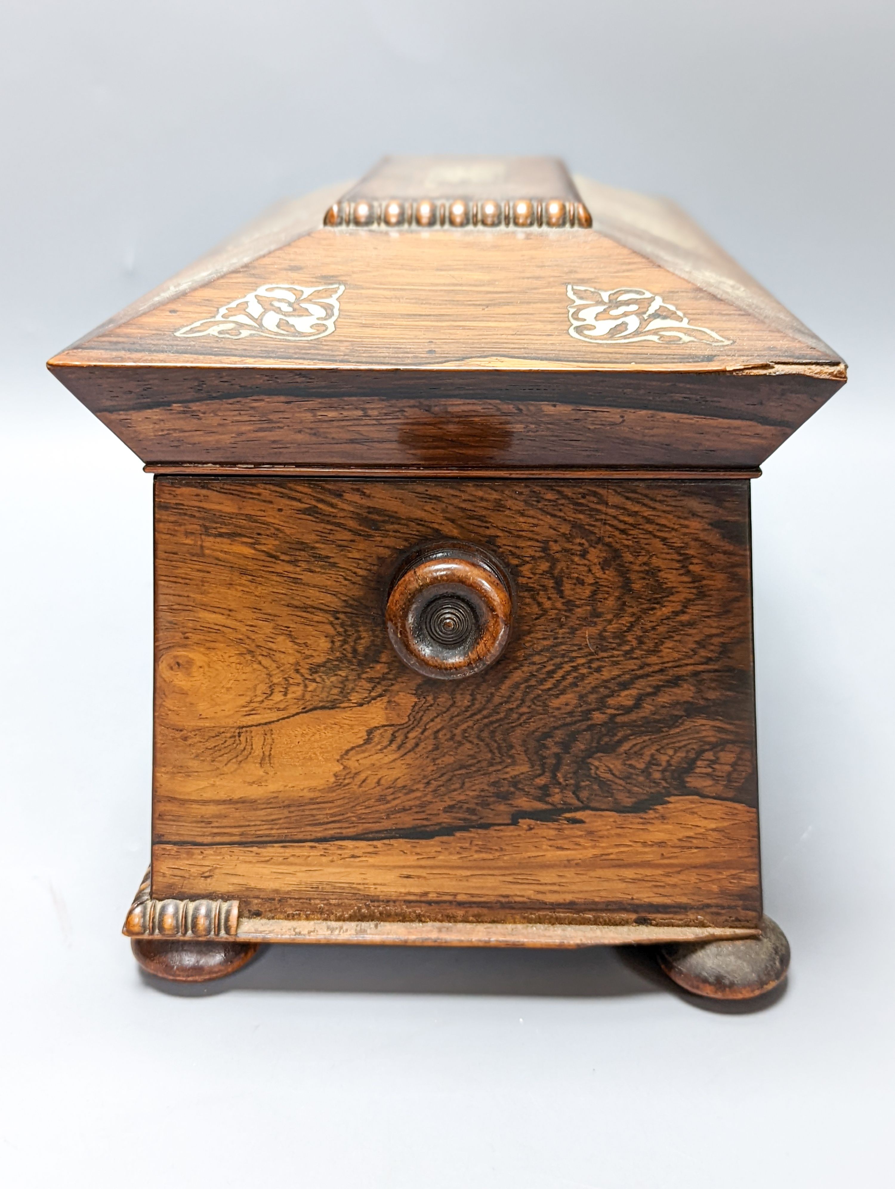 A William IV rosewood tea caddy with mother of Pearl inlay 33cm